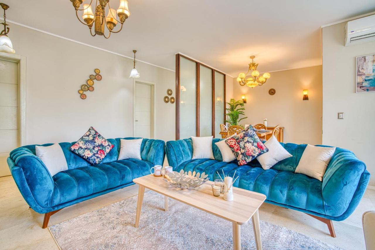 The Suites Near Auc By Elegant Cairo Exterior photo