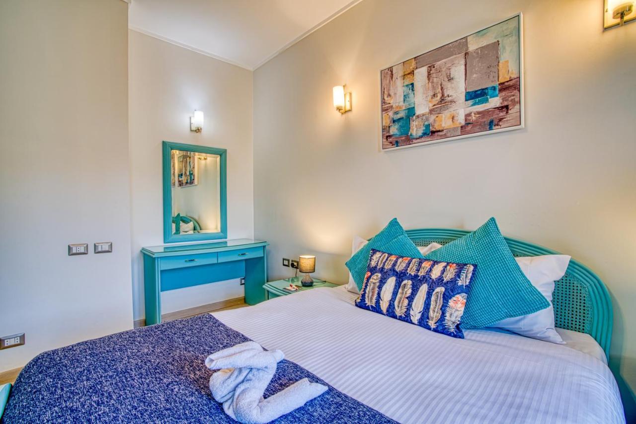 The Suites Near Auc By Elegant Cairo Exterior photo
