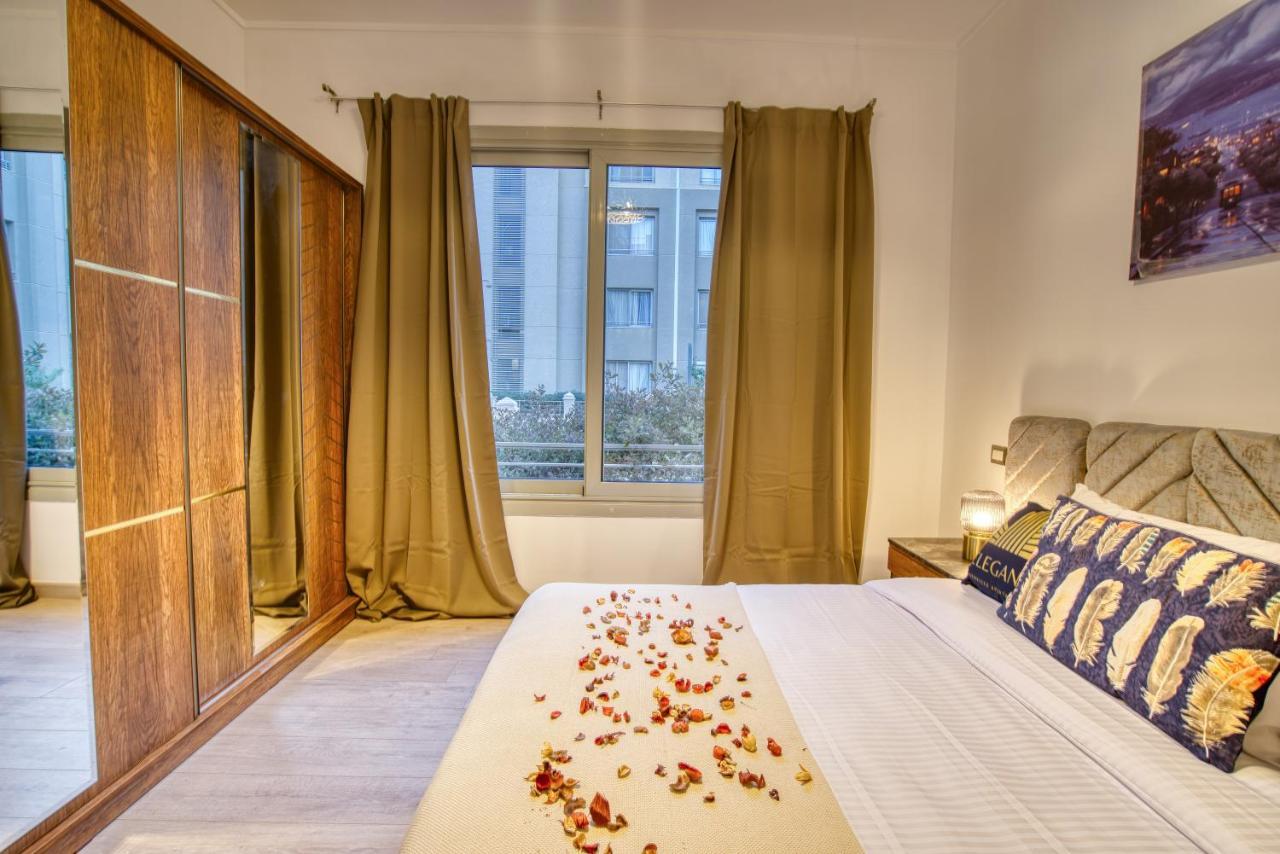 The Suites Near Auc By Elegant Cairo Exterior photo