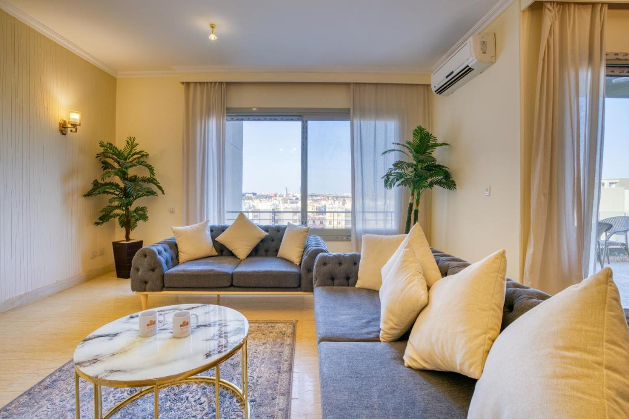 The Suites Near Auc By Elegant Cairo Exterior photo