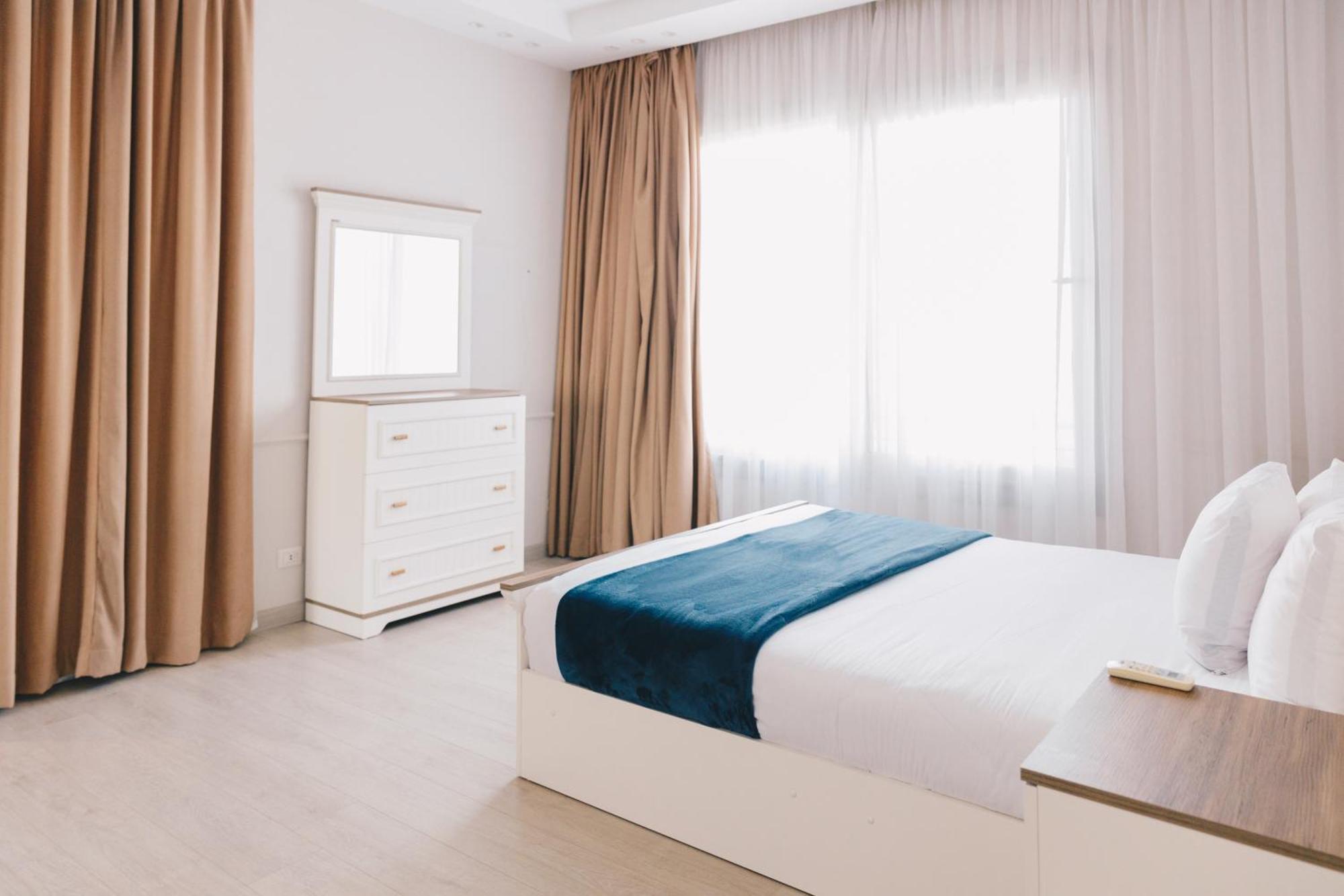 The Suites Near Auc By Elegant Cairo Exterior photo