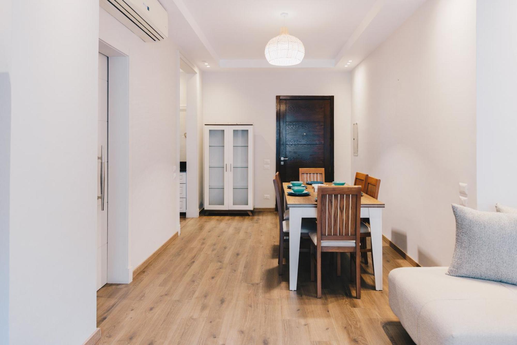 The Suites Near Auc By Elegant Cairo Exterior photo
